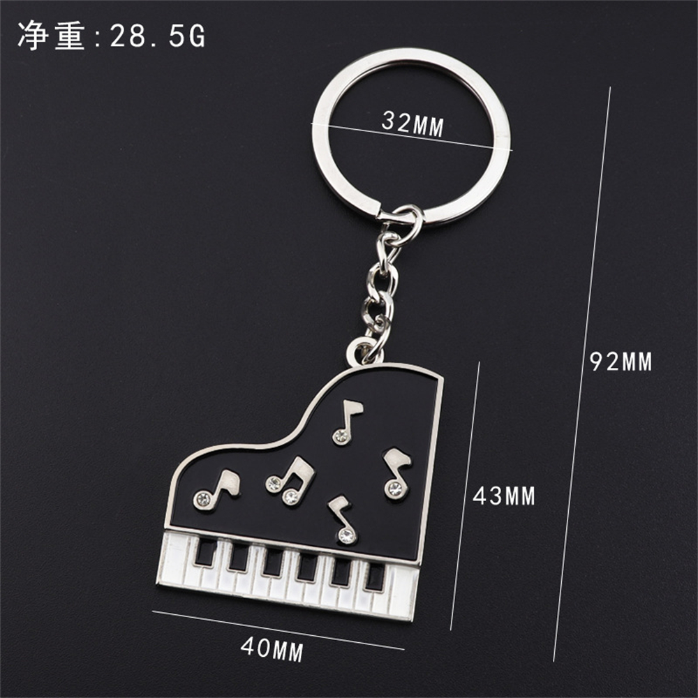 Metal Piano Note Shape Key Cha - огляд і ціна Audio Music Notes